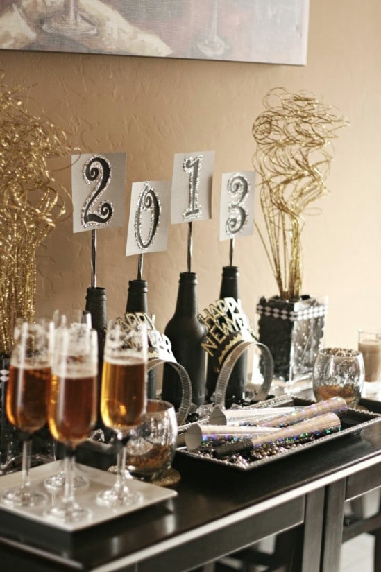 Glittery Centerpiece - 28 Fun and Easy DIY New Year’s Eve Party Ideas